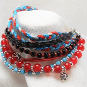 Handmade bracelet with rows of threads, beads, and charms No. 234